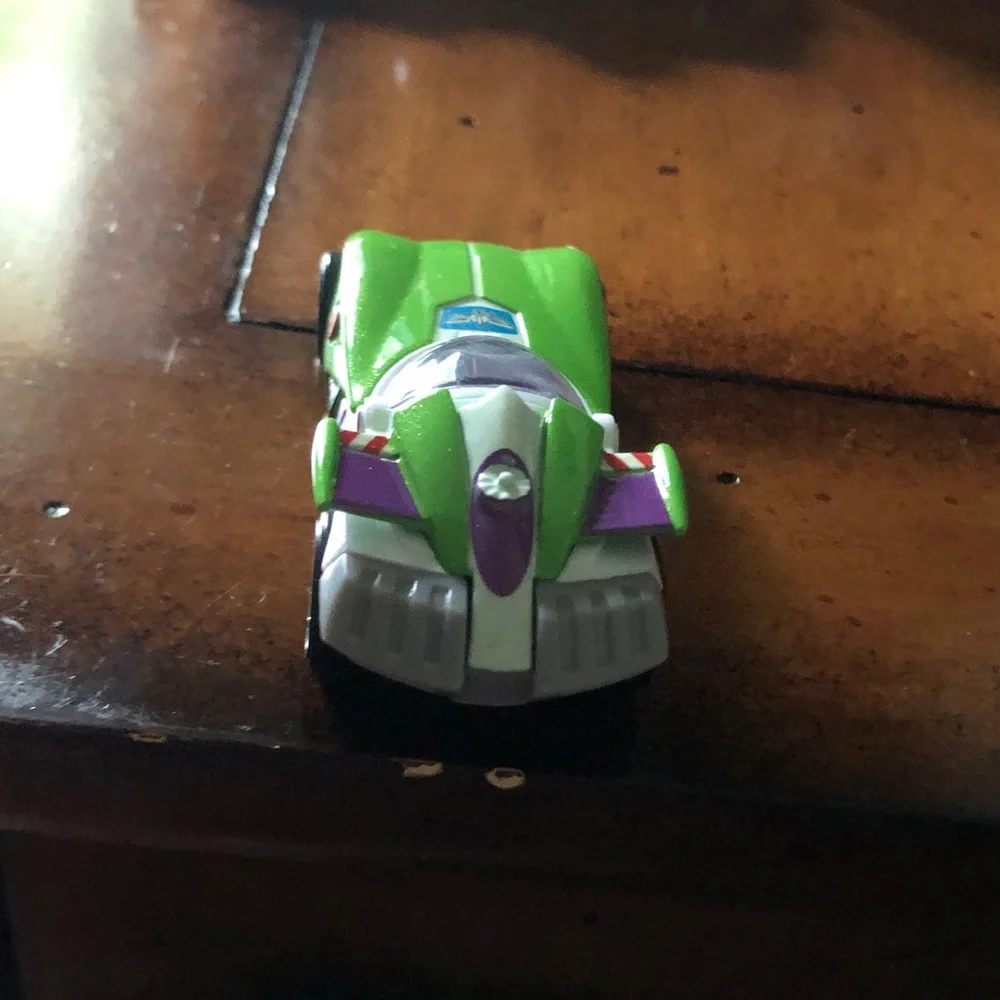 Green Toy Race Car with Purple Accents